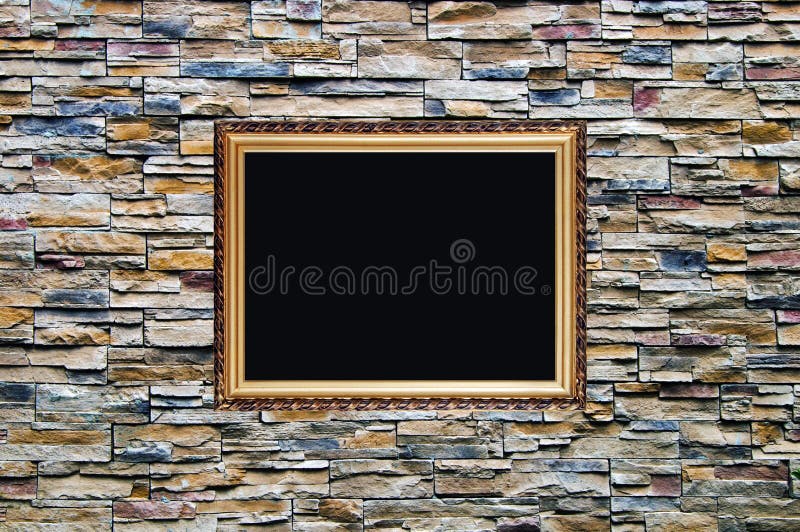 The bright and nice artificial ornamental stone wall with old russian style wooden photo frame with stucco moulding. The bright and nice artificial ornamental stone wall with old russian style wooden photo frame with stucco moulding