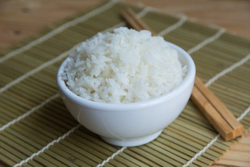 Jasmine rice in bowl stock photo. Image of dish, grain 133681912