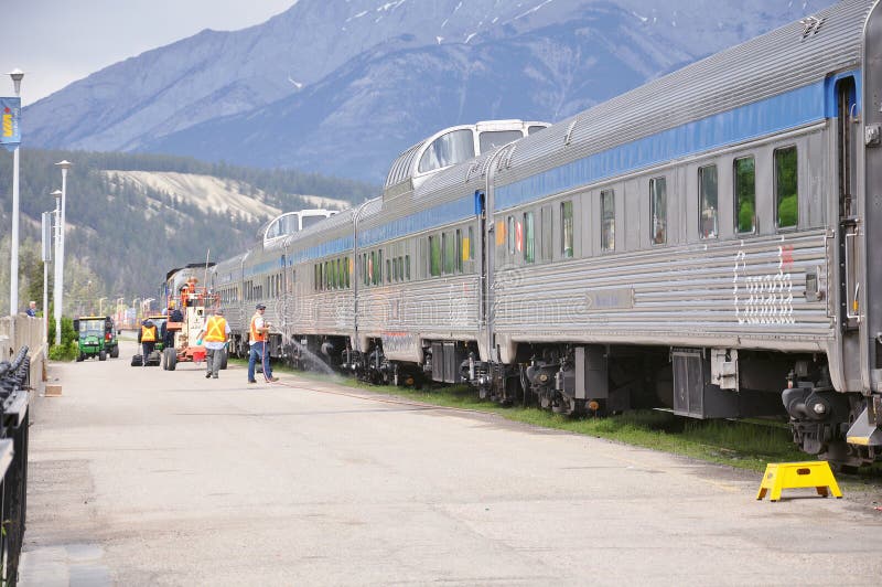 Passenger Train from Vancouver Stands at Jasper Station Platform after