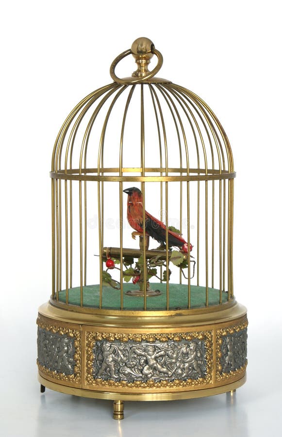 This is a vintage brass musical cherub bird cage from Germany from the 1960s. This is a vintage brass musical cherub bird cage from Germany from the 1960s.