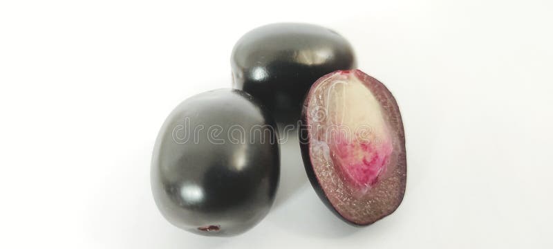 Java plum or jamun fruit on white background royalty free stock images.