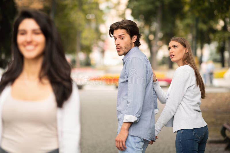 Jealous Girlfriend Calling Boyfriend Distracted By Other Attractive Woman