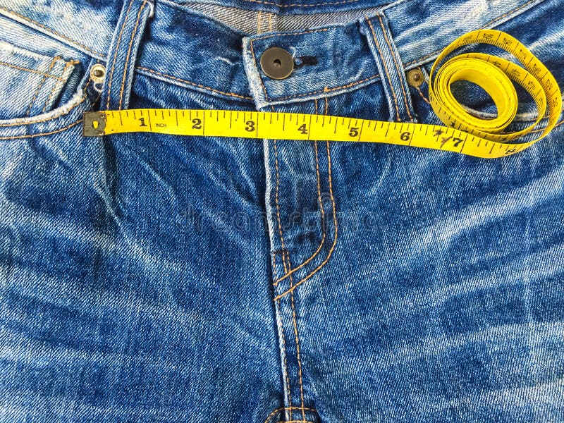 Jeans with measuring tape stock image. Image of fashion 78860967