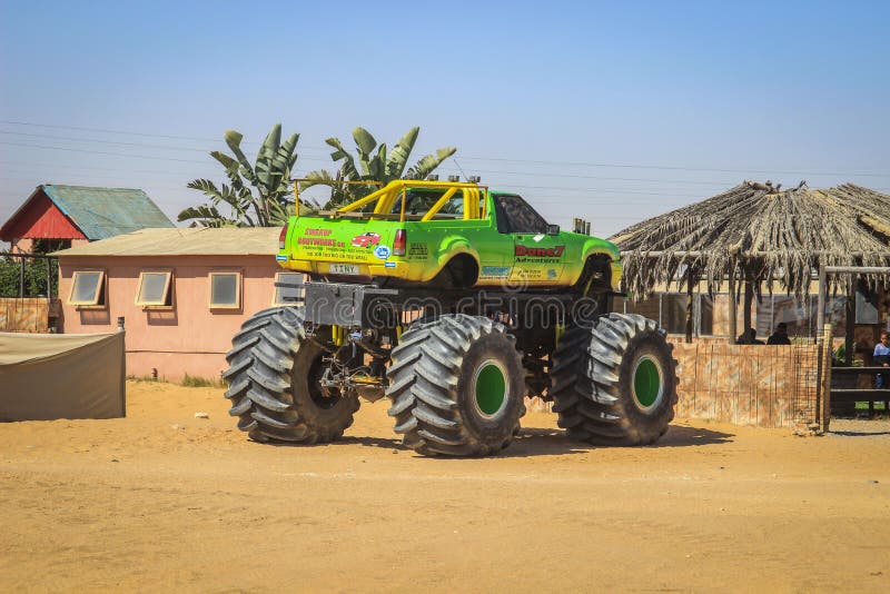 Jeep car on huge powerful wheels for a rally in the Namib desert. Tourist attraction royalty free stock photo Jeep car on huge powerful wheels for a rally in the Namib desert. Tourist attraction royalty free stock photo