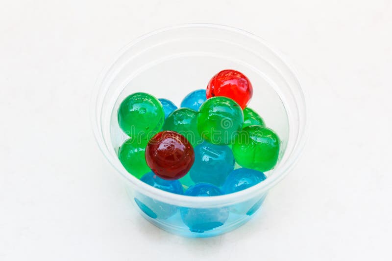 Jelly ball in plastic cup. stock photo. Image of closeup 85528142