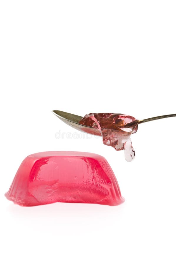Jelly with a spoon royalty free stock image
