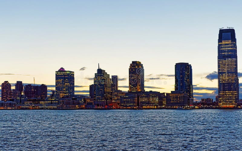 Jersey City Skyline with Skyscrapers at Night Reflex Stock Image