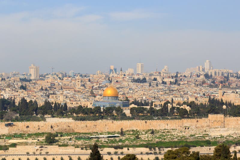 Jerusalem Old city cityscape panorama with Dome of the Rock with gold leaf on Temple Mount and Rotunda of Church of the Holy