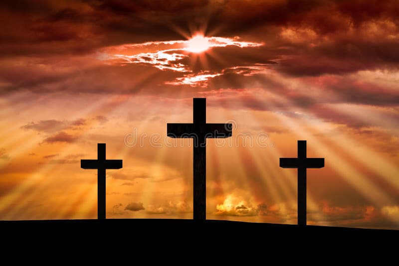 Jesus Christ cross. Easter, Good Friday concept. Jesus Christ cross on a background with dramatic sky, lighting, colorful red, orange sunset, dark clouds stock photography