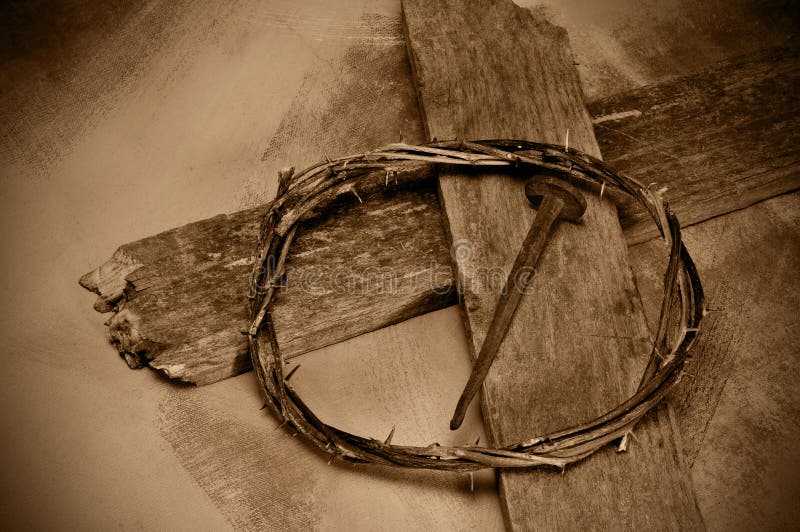 Jesus Christ cross, nail and crown of thorns. Closeup of a representation of the Jesus Christ crown of thorns, cross and nail stock photos
