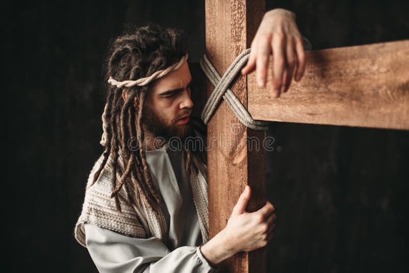 Jesus Christ mit Kreuzigung auf schwarzem Hintergrund lizenzfreies stockbild Jesus Christ mit Kreuzigung auf schwarzem Hintergrund lizenzfreies stockbild
