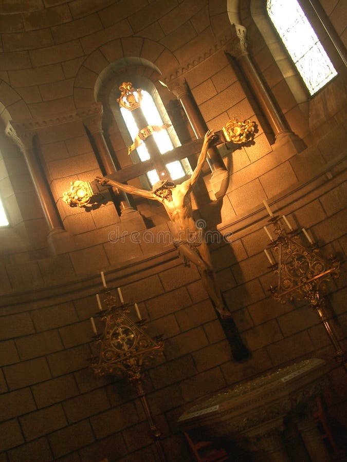 Jesus on cross in interior of the imposing ancient cathedral of Monaco where was celebrated the marriage between Ranieri III di Monaco and Grace Kelly