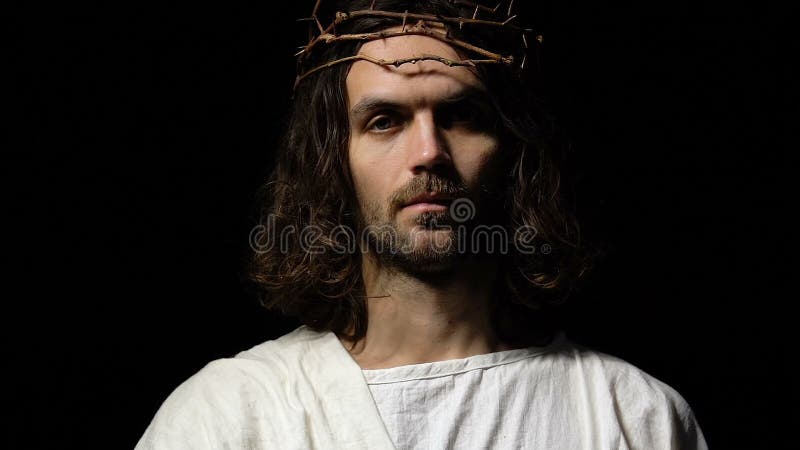 Jesus i krona av taggar som når hjälpande den ut handen, besparingsyndare, religion