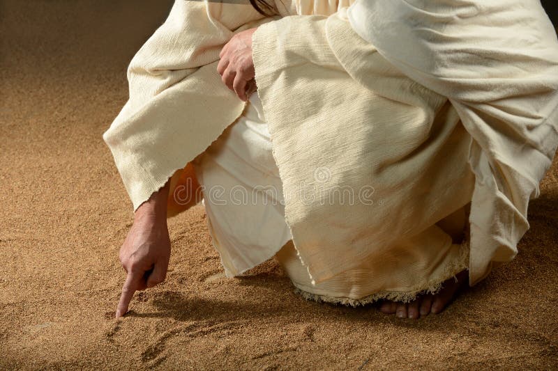 Jesus Writing won the sand. Jesus Writing on the sand with his finger royalty free stock image