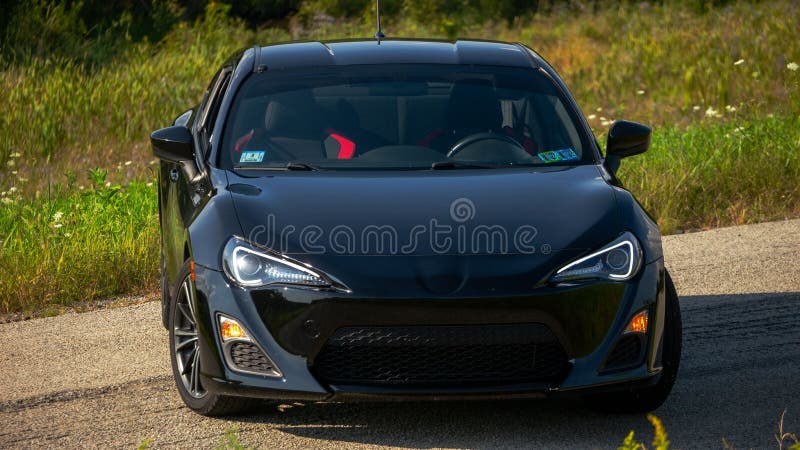 Jet-black Two-door Scion Car on the Road. Editorial Image - Image of ...