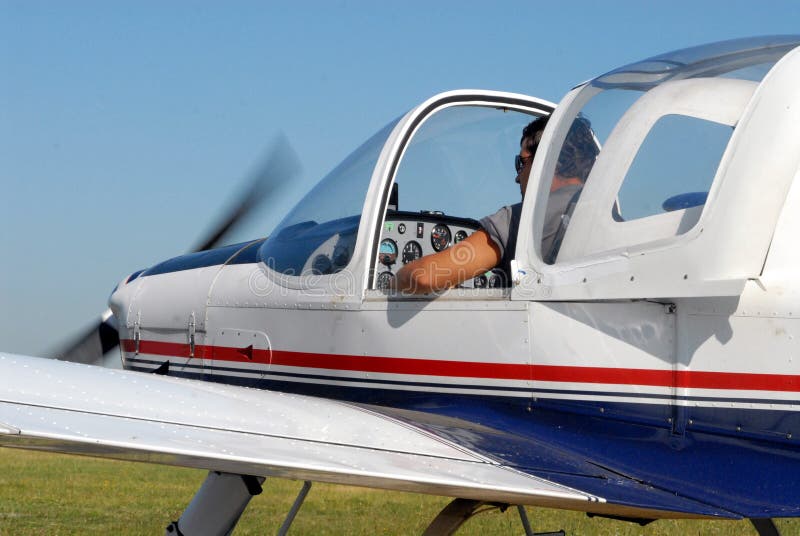 Pilot near helicopter stock image. Image of outside, rotors 7011525