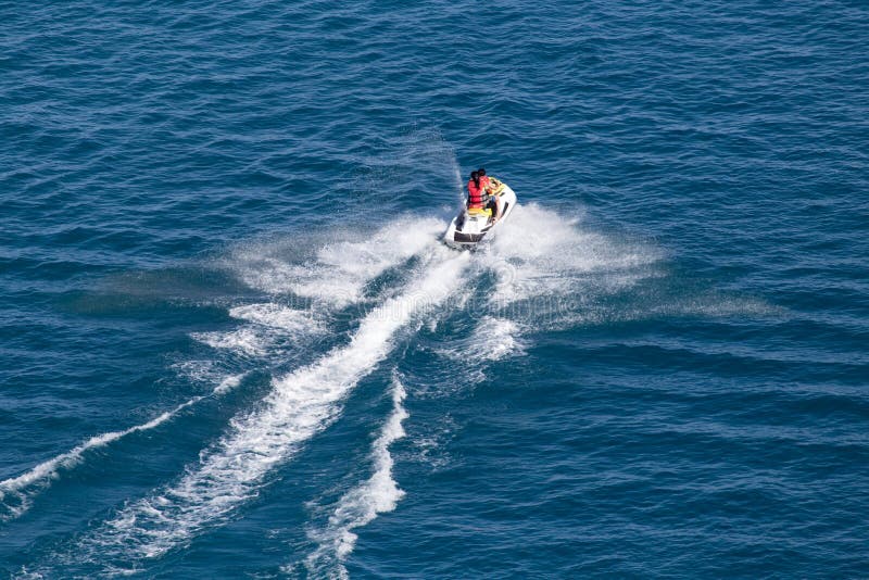 Jet Ski on the Surface of the Water at a Speed of Stock Photo Image