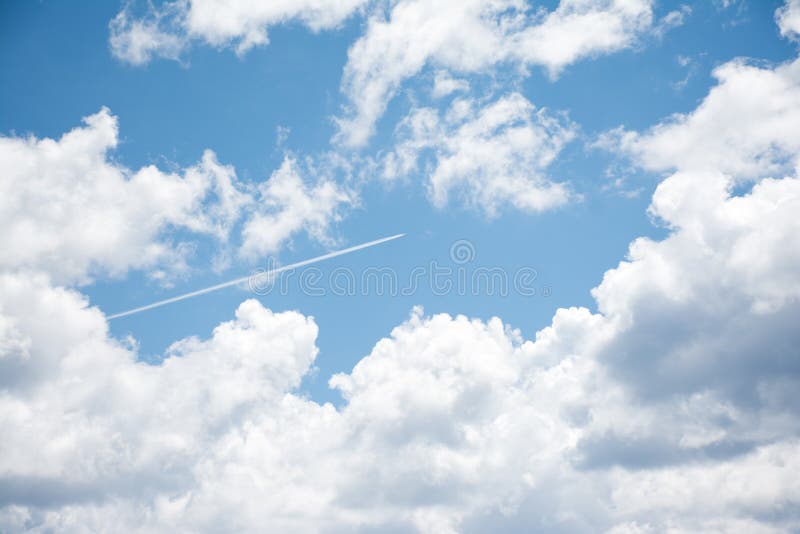 Jet Streak through Clouds stock photo. Image of streak - 80516838