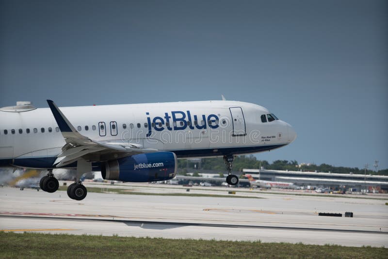 Photo of a Jetblue Airplane Tail with Company Logo Editorial Image Image of shot, wing 148530205