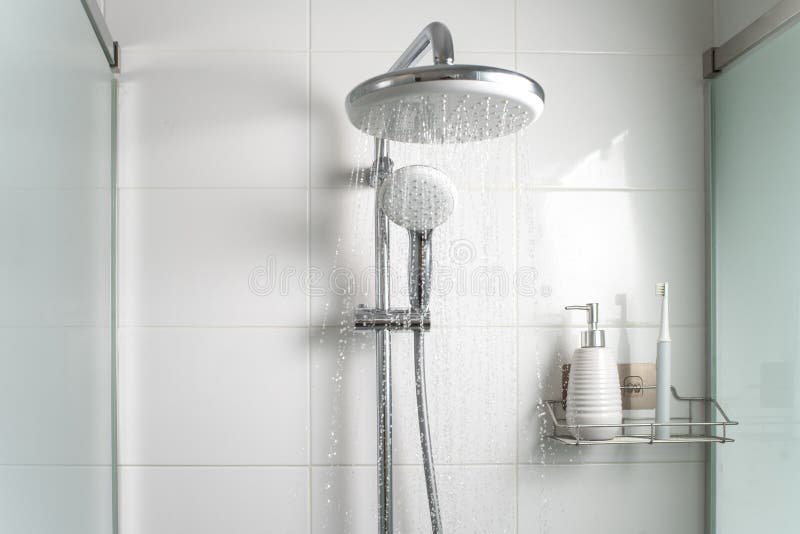 Jets of Clean Water Flow in the Shower Cabin. Stock Photo Image of