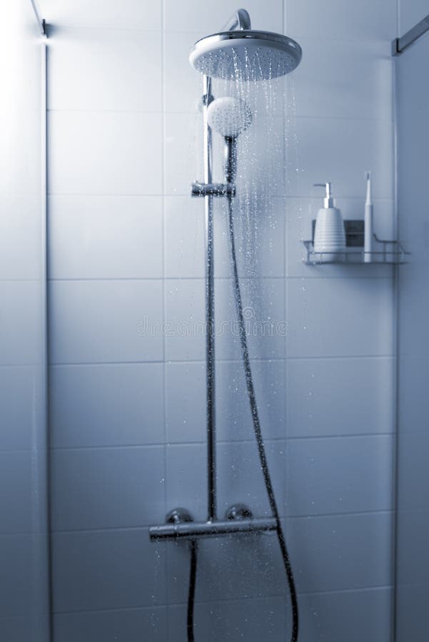 Jets of Clean Water Flow in the Shower Cabin. Stock Image Image of