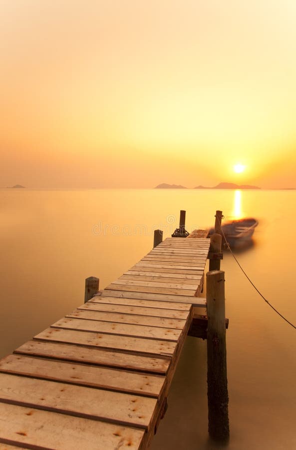 Jetty sunset over the ocean