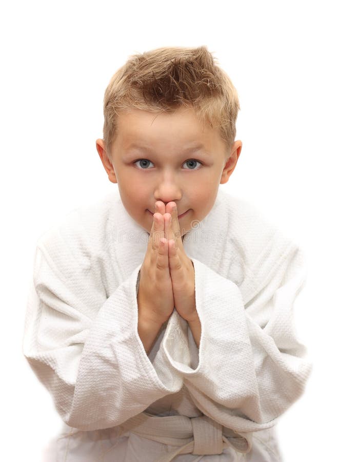 Jeune cintrage mignon de garçon photo stock Jeune cintrage mignon de garçon photo stock