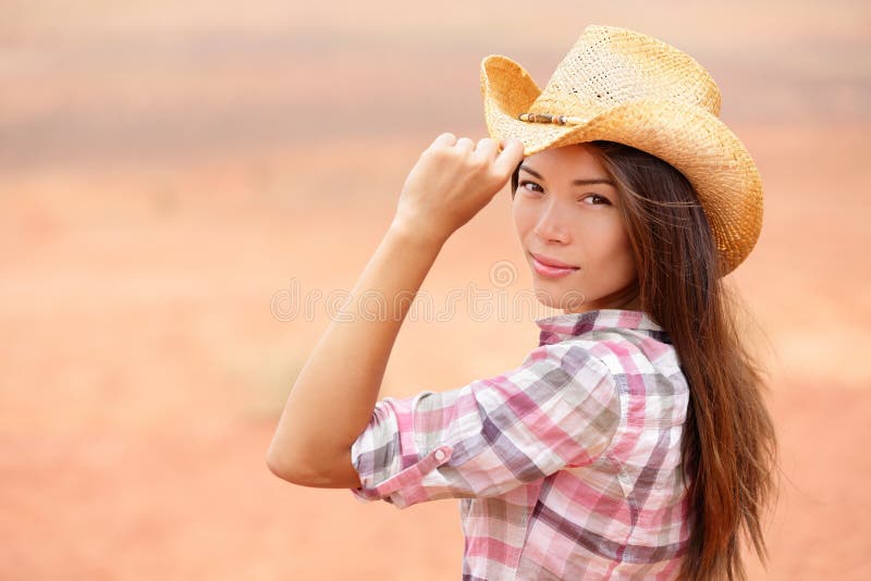 Jeune femme américaine de cow-girl image stock Jeune femme américaine de cow-girl image stock
