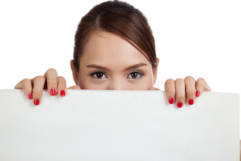 Jeune femme asiatique avec le signe vide photographie stock Jeune femme asiatique avec le signe vide photographie stock