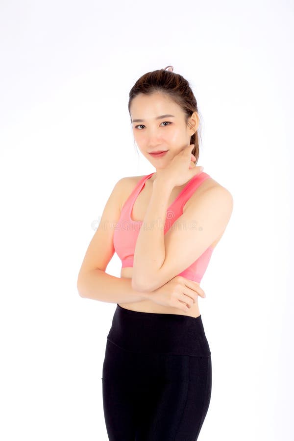 Jeune femme asiatique de beau portrait dans l'habillement de sport avec le sati photos stock Jeune femme asiatique de beau portrait dans l'habillement de sport avec le sati photos stock