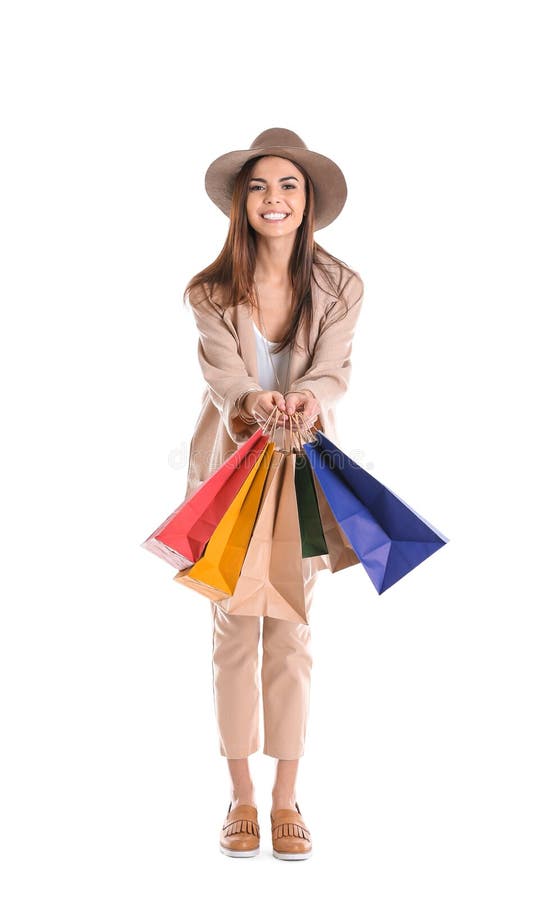 Jeune femme avec des sacs à provisions images libres de droits Jeune femme avec des sacs à provisions images libres de droits