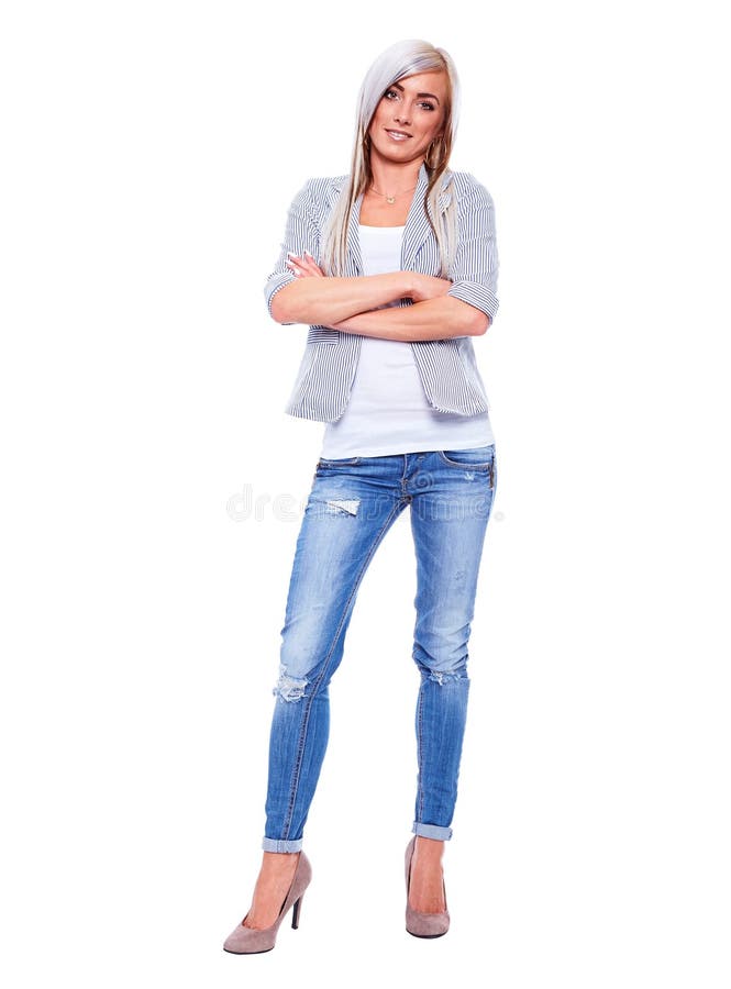 Jeune femme d'affaires dans le costume avec les bras croisés images stock Jeune femme d'affaires dans le costume avec les bras croisés images stock