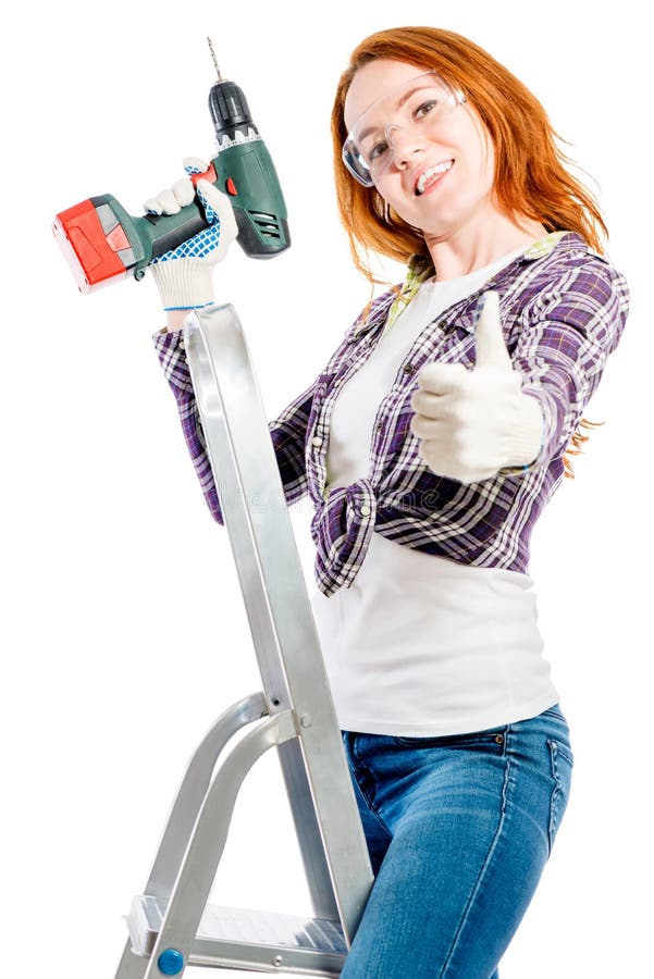 jeune femme heureuse avec un outil sur un blanc photographie stock jeune femme heureuse avec un outil sur un blanc photographie stock