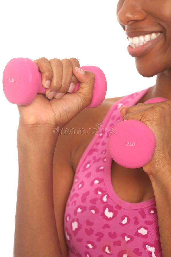 Jeune femme heureuse établissant et faisant des activités de forme physique photos stock Jeune femme heureuse établissant et faisant des activités de forme physique photos stock
