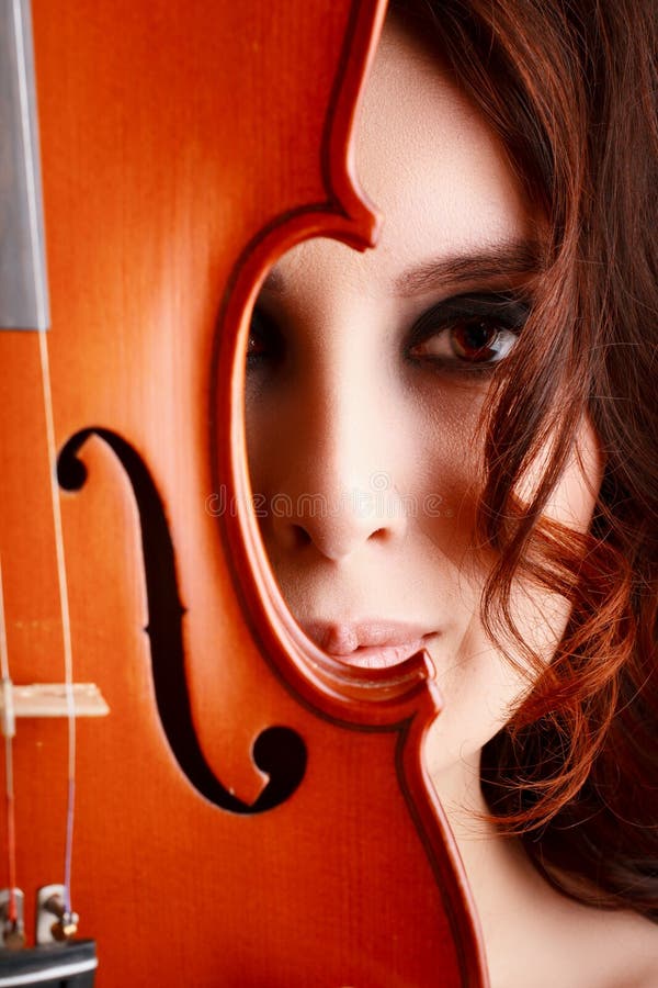 Jeune fille avec le violon image libre de droits Jeune fille avec le violon image libre de droits