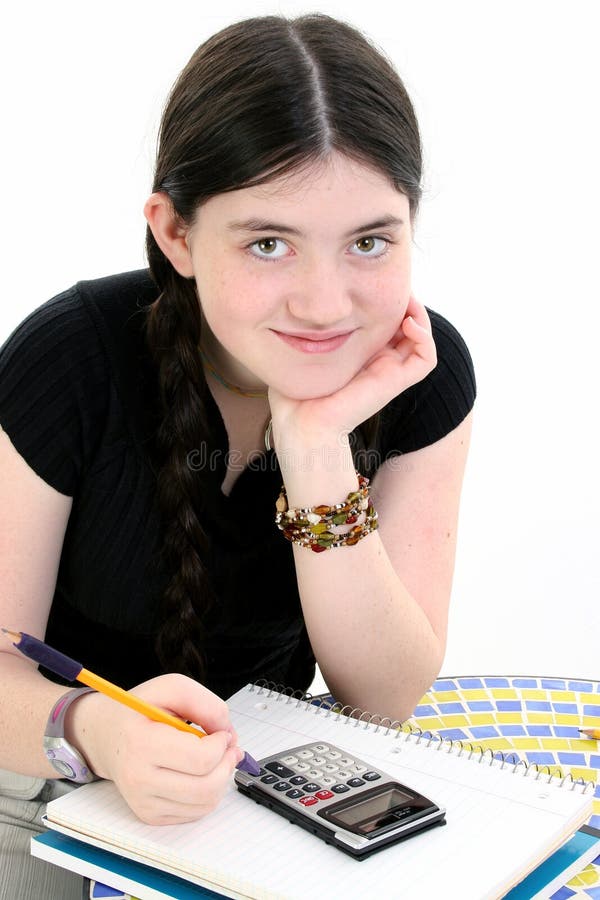 Jeune fille faisant son travail photographie stock Jeune fille faisant son travail photographie stock