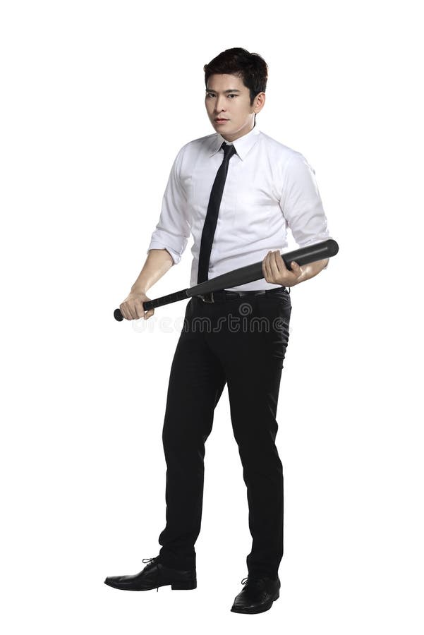 Jeune homme d'affaires tenant la batte de baseball images stock Jeune homme d'affaires tenant la batte de baseball images stock