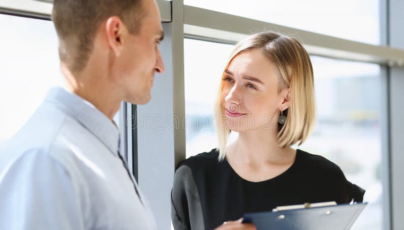 young beautiful man and woman meet in cafe business concept. young beautiful man and woman meet in cafe business concept