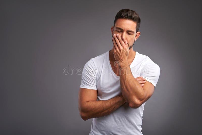 Jeune homme inquiété images libres de droits Jeune homme inquiété images libres de droits