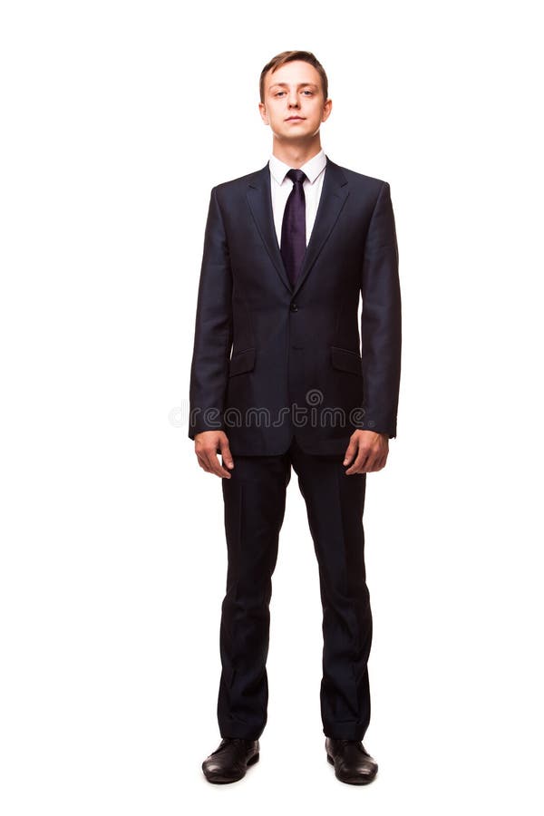 Jeune homme élégant dans le costume et le lien Type d'affaires Homme bel tenant et regardant l'appareil-photo image stock Jeune homme élégant dans le costume et le lien Type d'affaires Homme bel tenant et regardant l'appareil-photo image stock