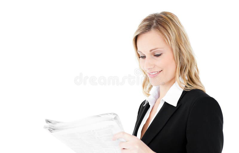 Friendly young businesswoman reading newspaper against white background. Friendly young businesswoman reading newspaper against white background