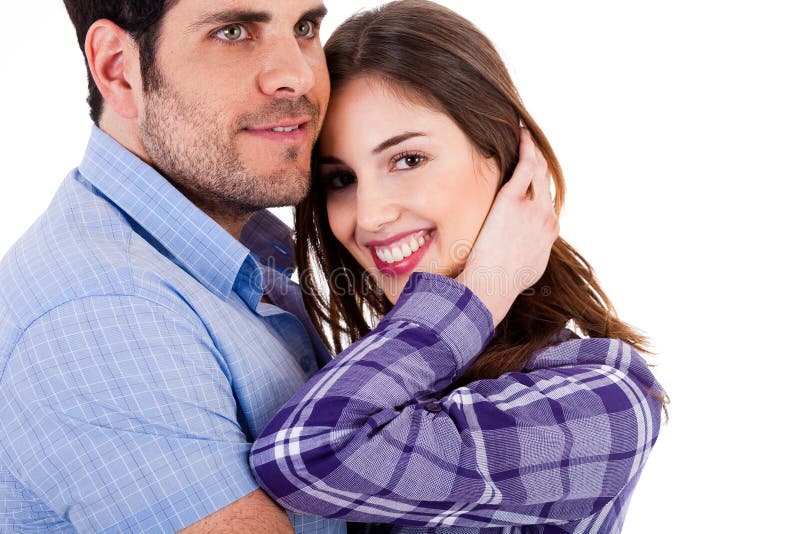 Young couples enjoying their love close up shot on a white background. Young couples enjoying their love close up shot on a white background