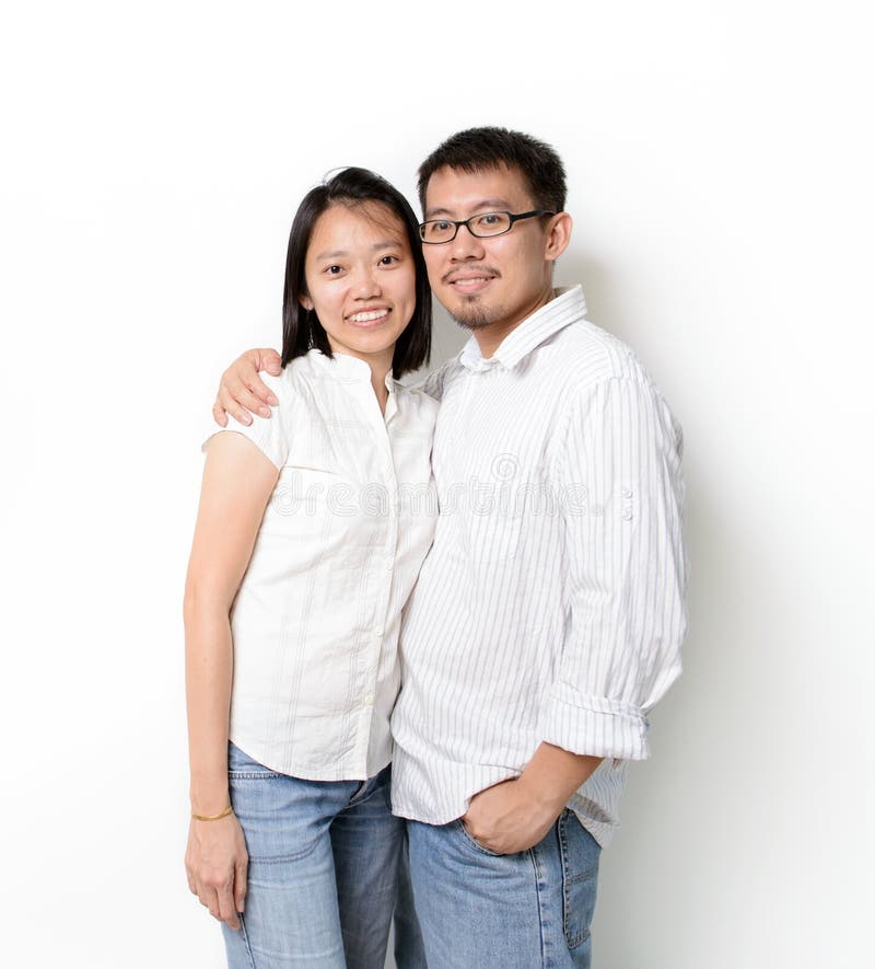 Happy young Asian couples on white background. Happy young Asian couples on white background