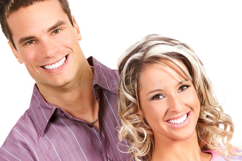 Young love couple smiling. Over white background. Young love couple smiling. Over white background