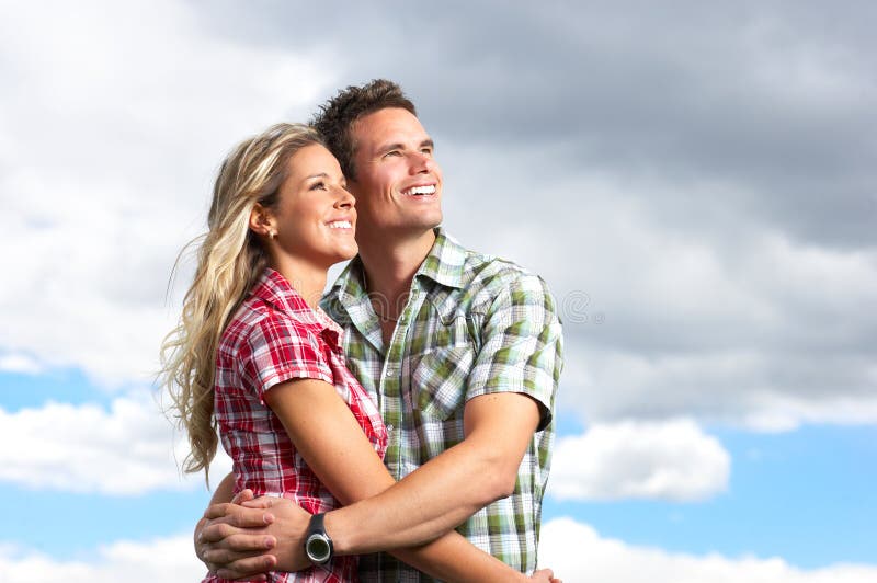 Young love couple under the storm-clouds. Young love couple under the storm-clouds