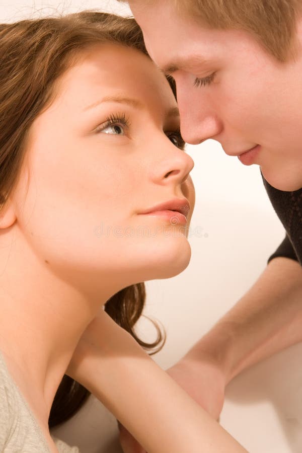 Young couple in love, face to face. Young couple in love, face to face