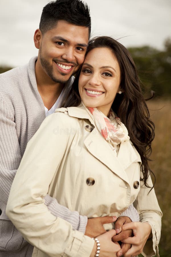 Young attractive happy couple in love. Young attractive happy couple in love.