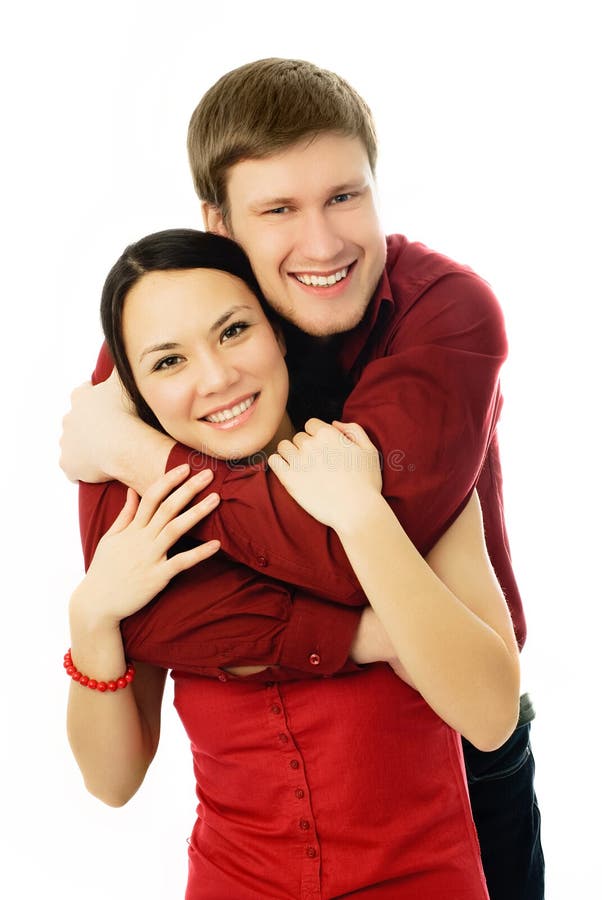 Happy young couple isolated against white background. Happy young couple isolated against white background