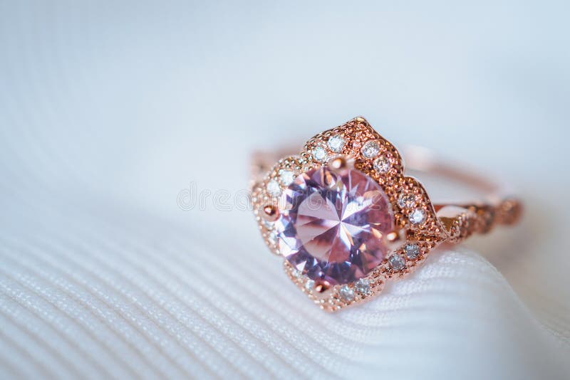 Jewelry luxury pink gold sapphire gemstone ring background