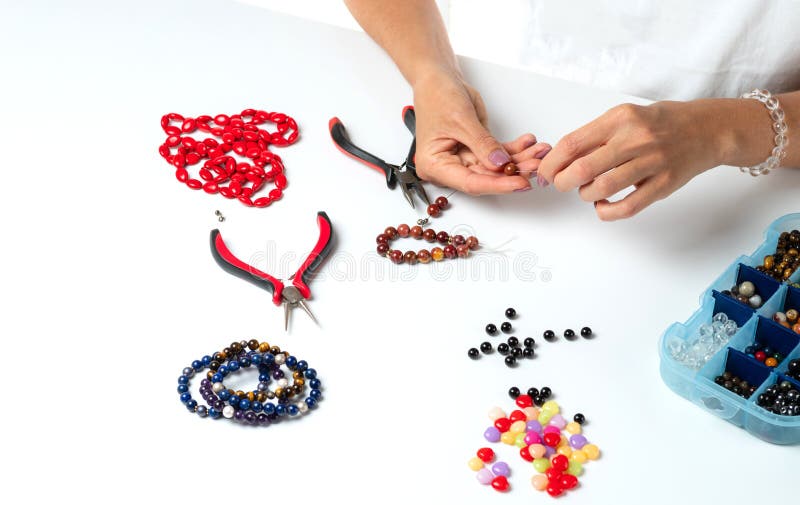 Making Bracelet Of Colorful Beads Female Hands With A Tool Stock Photo -  Download Image Now - iStock